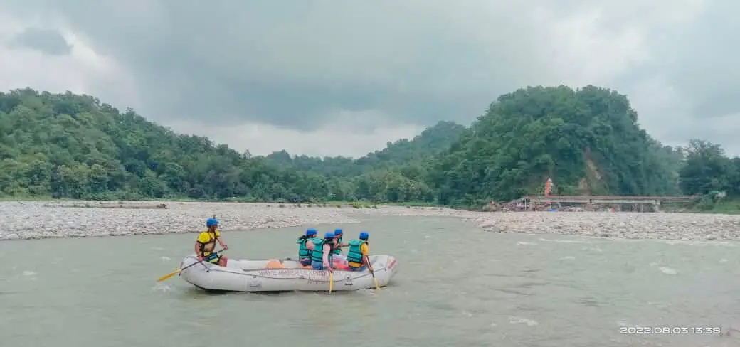 Family enjoying a calm river rafting trip