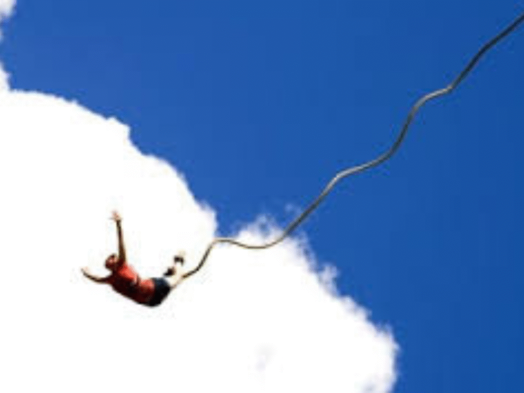 Tourist enjoying 104 metre roof bungee jump in Jim Corbett